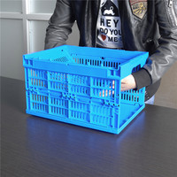 Caisse en plastique pliable et empilable en maille orange pour le stockage et le transport des tomates de ferme, recyclable