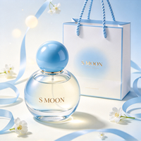 Nouvelle conception, flacon de parfum en verre mignon de 50 ml et 100 ml avec bouchon à bille coloré et boîte, flacon en verre vide personnalisé de 30 ml et 75 ml pour parfum