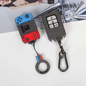 Bonito estuche protector de silicona de dibujos animados accesorio de llavero para llaves de coche Audi paquete completo diseño creativo de moda - Product Image 2