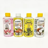 Huile de massage hydratante pour le visage et le corps au curcuma, à la noix de coco, à la carotte et à la vitamine C pour la réparation et l'éclaircissement de la peau