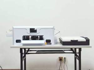 Imprimante numérique à jet d'encre de bureau automatique sans bordure RIIN XP600 blanche CMYK pour l'impression de matériaux souples en cuir DTF A3 1 an - Product Image 2
