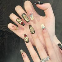 En gros Faux ongles à presser de luxe noirs effet œil de chat, longs forme cercueil, avec breloque croix 3D, papillon, perle, finition brillante, style gothique, pour salon