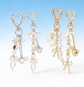 תליון אופנתי בצורת לב עם קשת, משובץ קריסטל נוצץ, פנינים וסגסוגת אבץ, עמיד למים, מתאים לתלייה על תיק או טלפון נייד. - Product Image 2