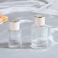 Bouteilles de parfum en verre en forme de cylindre de 30ml 50ml 100ml flacons vaporisateurs de parfum vides transparents et contenants d'huiles essentielles rechargeables