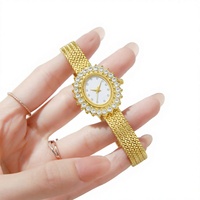Montre-bracelet élégante pour femme, style rétro, vente en gros, usine source, dorée, avec lunette en cristal tournesol, cadran blanc, bracelet tressé