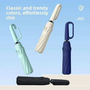 Paraguas de Sol Negro de Vinilo Reforzado y Engrosado, Portátil, con Hebilla Automática de Tres Pliegues, Resistente a Tormentas, Protección UV, 10 Varillas, con Logotipo - Product Image 1