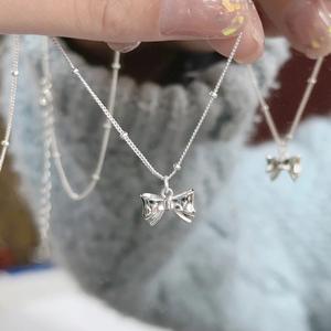 Exquisito Collar de Plata de Ley S925 con Colgante de Lazo y Campana, Cadena de Clavícula con Circonita de Cristal y Oro de 14K, Diseño de Nicho, Estilo Dulce y Femenino - Product Image 2