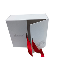Boîte en papier de luxe en carton recyclable avec logo personnalisé en vente libre avec nœud en ruban pour vêtements Boîte d'emballage pour chaussures Boîte cadeau