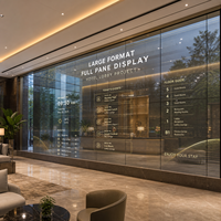 Écran LED transparent grand format personnalisé pour le projet de mur en verre du hall d'hôtel