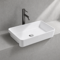 Lavabo semi-suspendu en céramique pour le lavage des mains, lavabo semi-encastré pour hôtels et usage domestique