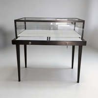 Table de présentation de bijoux en métal noir de luxe avec vitrine en verre moderne, éclairage LED et tiroir verrouillable pour boutique de détail