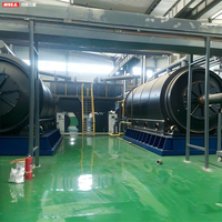 Machine de pyrolyse intermittente de pneus pour la transformation de la boue huileuse et des produits plastiques en mazout, avec des pneus de pointe pour le broyage.