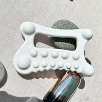 Offre Spéciale outil de Massage du corps et du visage en céramique de corée 100% outil de guasha en céramique pour la libération du visage outils de Relaxation du visage