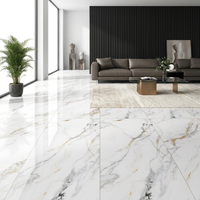 Dalles en porcelaine effet marbre Calacatta Gold poli et émaillé 750x1500mm pour salon