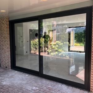 Puertas y ventanas corredizas industriales de aluminio de alta resistencia de tamaño personalizado a prueba de sonido de aluminio más paneles puerta corredera para la venta - Product Image 1