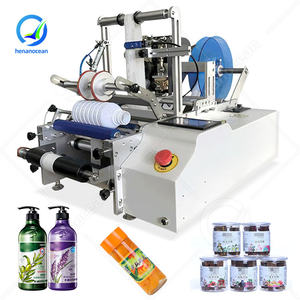 Etiqueteuse semi-automatique à colle humide double face OCEAN, manuelle, pour toutes formes de bouteilles, avec code - Product Image 1