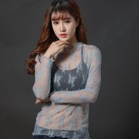 Blusa de encaje para mujer, camiseta de manga larga de malla, top corto de estilo extranjero, ropa sexy de malla hueca para primavera y otoño