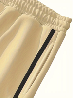 Pantalon de survêtement décontracté pour homme en polyester avec détails boutonnés, tissu tricoté couleur unie, coupe droite, taille élastique