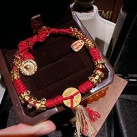 Bijoux de mode faits à la main : Anneaux et bracelet avec breloque pièce d'or et perle porte-bonheur, en corde rouge vintage de qualité supérieure, cadeau de festival