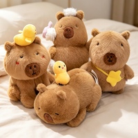 Peluche Capybara Moelleuse et Douce, Assise ou Allongée, avec Mini Canard et Étoile Décorative, Idéale pour Cadeau d'Anniversaire pour Enfants