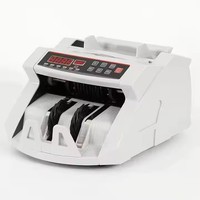 Compteur de billets portable pour dollars canadiens, bahts thaïlandais, réals brésiliens, euros, pesos philippins, wons coréens et dollars américains avec détection UV/MG et tri des devises