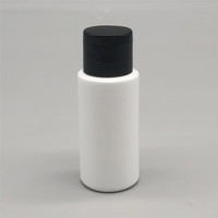 Flacon cylindrique compressible en PEHD de 30 ml (1 oz) avec bouchon à vis et embout applicateur sérigraphié pour huile capillaire et lotion