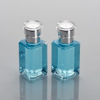 Flacon de parfum de luxe bleu rectangulaire 30ml 50ml 100ml avec impression sérigraphique, emballage cosmétique carré avec bouchon argenté