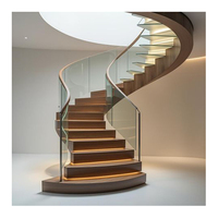 Rampe en verre circulaire de conception moderne avec l'escalier en spirale en acier pour l'application d'appartement
