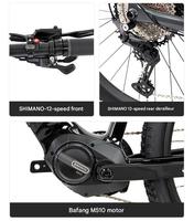 NOUVEAU Vélo de Montagne Électrique 29 pouces EM5 2026 avec Moteur Central, Cadre en Fibre de Carbone, Freins à Disque Hydrauliques 4 Pistons, Batterie Lithium 12 Vitesses 720Wh