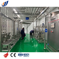 Ligne complète complètement automatique machine aseptique de pasteurisation UHT de laiterie avec le remplisseur de carton de rendement élevé