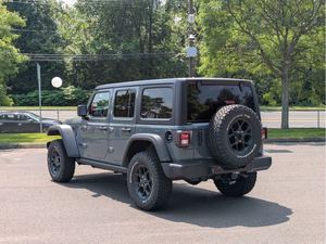 <span class=keywords><strong>Jeep</strong></span> <span class=keywords><strong>Wrangler</strong></span> 4 <span class=keywords><strong>portes</strong></span> 4x4 SUV 2024 d'occasion en excellent état, conduite à gauche, sièges en tissu foncé, transmission automatique R19, écran tactile halogène LED - Product Image 4