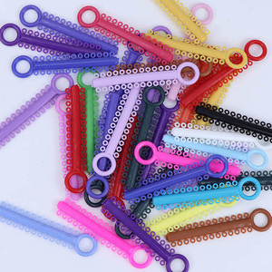 Ligaduras Ortodónticas Transparentes de Elastómero de Colores, Paquete de 40 Tiras para Corrección Dental - Product Image 2
