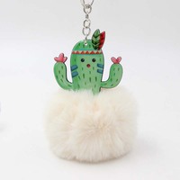 Vente en gros de caoutchoucs souples décoration de plantes porte-clés de voiture accessoires en forme de boule de fourrure porte-clés cactus gonflé en pvc personnalisé pour ornements