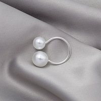 Bague d'ouverture Double perle de style exagéré minimaliste pour femme Design Corée du Sud Incrustation en alliage plaqué or Numéro réglable