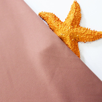 Sensation de main douce 220gsm nylon spandex interlock robe tissu en gros