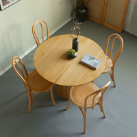 Table à manger ronde nervurée cannelée en bois massif de chêne naturel de luxe nordique