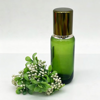 Nouvelle arrivée, flacon cosmétique en verre vert haut de gamme avec bouchon et compte-gouttes électro-plaqué, flacon en verre pour sérum