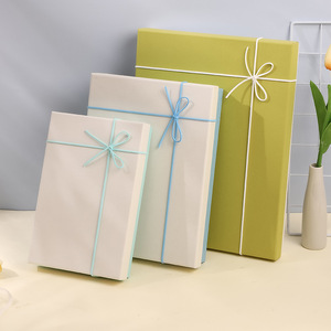 Cajas de regalo rígidas rectangulares de cartón color marfil con cinta, empaque de alta gama para productos de belleza - Product Image 1