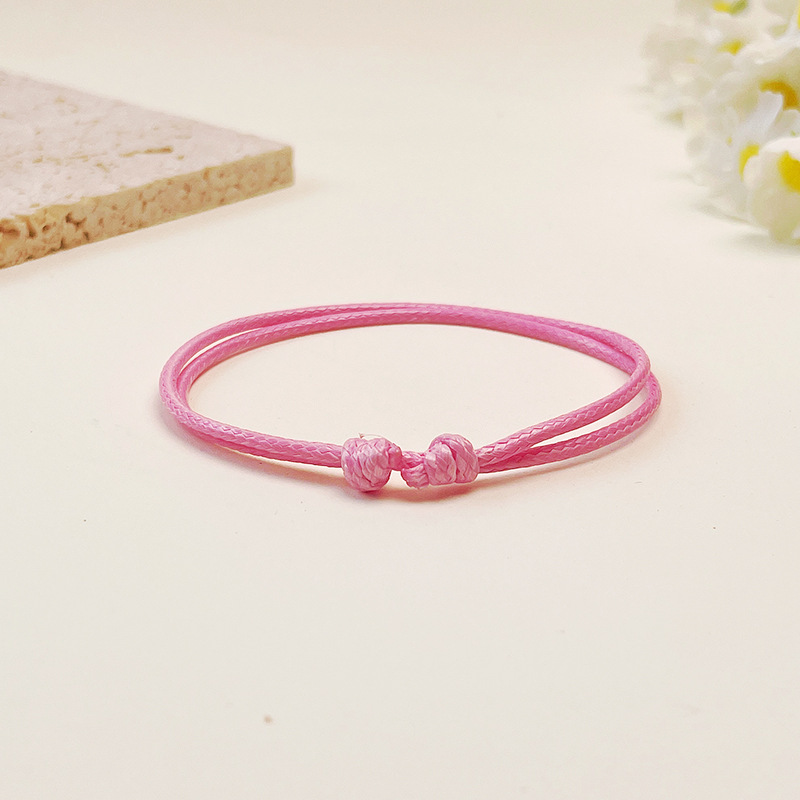 Corda a mano in filo di cera rosa