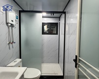 Maison conteneur gris clair de 30 pieds, préfabriquée temporaire et extensible, pour espaces familiaux, appartement pour seniors, bureau sur site, vacances à la plage