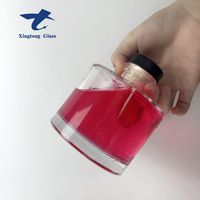Vente en gros de mini bouteilles en verre de forme ronde de haute qualité à fond épais Gin Rhum Vodka Tequila Liqueur Alcool Spiritueux