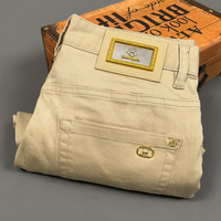 Jeans noirs tendance haut de gamme pour hommes, luxe léger, coupe droite simple, pantalon décontracté élastique à la mode et polyvalent