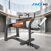Machine de musculation des mollets assise Smart Fitness MND F62 pour l'entraînement de force en milieu de luxe (hôtels et centres de fitness)