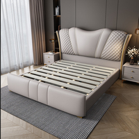 Lit capitonné moderne en cuir de luxe italien avec rangement et éclairage LED, design ergonomique, idéal pour appartement, tailles Queen et King