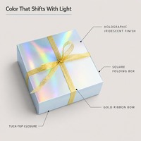 Boîte pliante carrée holographique irisée personnalisée avec nœud en ruban doré pour cosmétiques et bijoux – Vente en gros usine