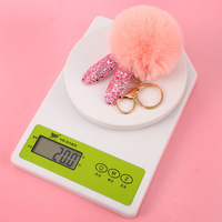 Porte-clés en fausse fourrure pompon 8 cm, style simple, mignon et moelleux, vente en gros 2025, personnalisable, prix abordable