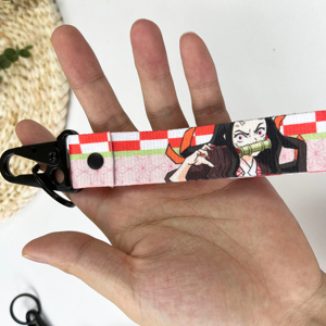 Usine personnalisée 5000 aigle métal porte-clés brodé porte-clés une pièce Anime lanière courte porte-clés en nylon - Product Image 5