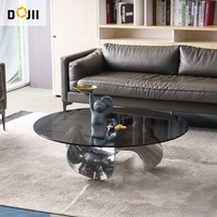 Design de luxe haut de gamme créatif nouvelle Table à thé en verre trempé noir avec base abstraite pour Villa pour meubles de salon