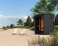 Sauna à vapeur compact en bois massif, design cube, écologique, avec verre panoramique, pour une relaxation moderne en bord de mer et en vacances
