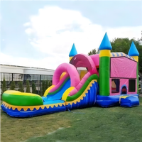 Château gonflable sautant Juego d'occasion avec toboggan aquatique à vendre